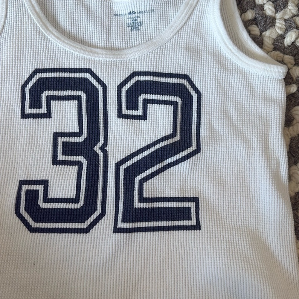 brandy melville waffle tank can’t find online but assuming bought for around 18